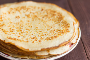 Homemade freshly baked pancakes close up in rustic style