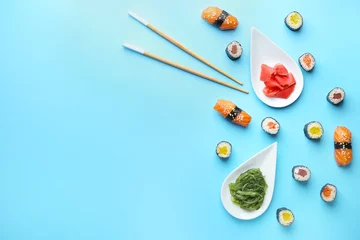 Foto op Plexiglas Composition with tasty sushi on color background © Pixel-Shot