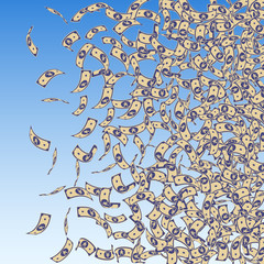 Chinese yuan notes falling. Small CNY bills on blu