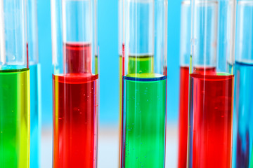 Test tubes with colorful samples, closeup
