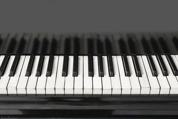 Keys of stylish grand piano