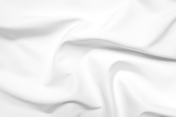 Abstract white fabric texture background. Cloth soft wave. Creases of satin, silk, and cotton.