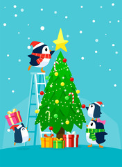 penguin family decorating christmas tree