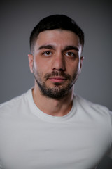 Fototapeta premium Portrait of a brutal young man.