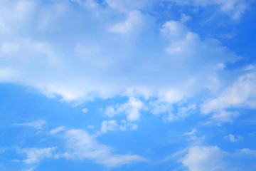 Background in the form of a clear sky with white clouds. The concept of a bright future. Clean and light. Divine essence.