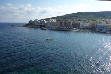 Naklejka premium View of the bay of Marsalforn, a town on the north coast of Gozo, Malta, the second largest island of the Maltese archipelago