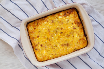 Homemade Cheesy Amish Breakfast Casserole, view from above. Flat lay, overhead, top view. Close-up.