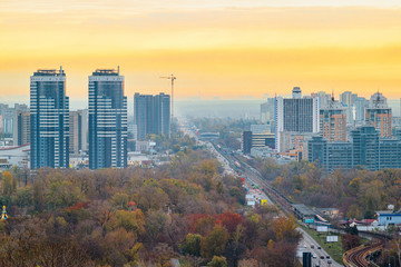 Kyiv city at sunrise in dawn, colorful autumn cityscape in the morning, Ukraine