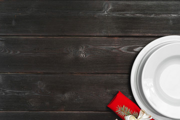 Elegant table setting with festive decor on wooden background