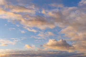 Naklejka na ściany i meble blue sky with white clouds at sunrise