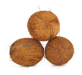 Whole coconut close up isolated on white background