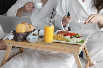Obraz na płótnie Canvas Breakfast in bed, cozy hotel room.