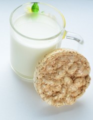crispbread and milk on a white background