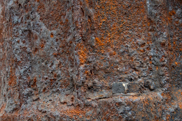 Rusty cast iron surface background image. Dark ground. top layers.