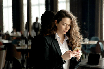 Hipster Woman use Laptop and cellphone