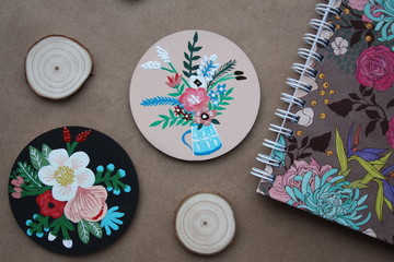 set of plates and flowers on table