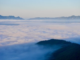 Fototapeta na wymiar mountains in the fog, Rural mountain views