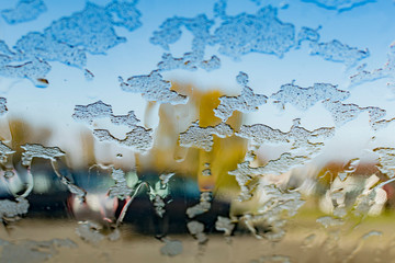 The icy glass of the car