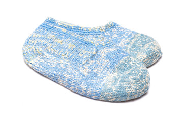 Woolen footsteps isolated on white background. Handmade knitwear.