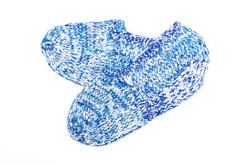 Woolen footsteps isolated on white background. Handmade knitwear.
