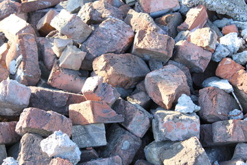 pile of broken bricks and asphalt. construction waste