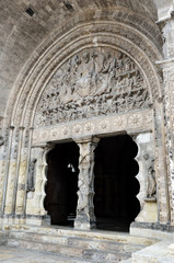 Entrance with bas-relief on the tympanum decorated with sculptures of apostles and saints in the Moissac Abbey 