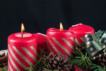 Advent candles on a black background