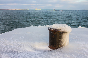 Naklejka premium Iron bitt in the snowdrift in the Baltic Sea. Tallinn. Estonia