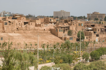Kashgar, China - even if almost totally demolished in favour of the "new" Old Town, more safe, clean and less chaotic, in Kashgar is still possible to spot few remaining buildings of the original one