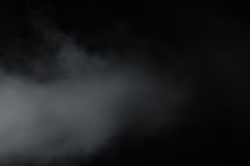 Smoke come from left side on black background. Like soft blur fog