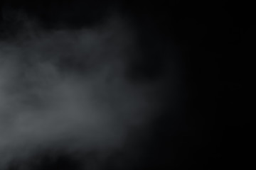 Smoke come from left side on black background. Like soft blur fog