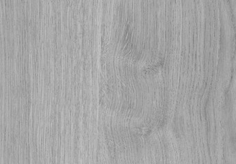 Obraz premium A Regular wood texture. Subtle color wooden background for natural banner. Timber surface closeup. Natural material for banner template. Wood surface background in shades of grey