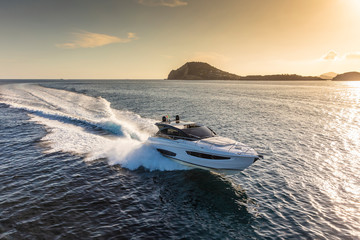 luxury motor yacht in navigation, aerial view - obrazy, fototapety, plakaty