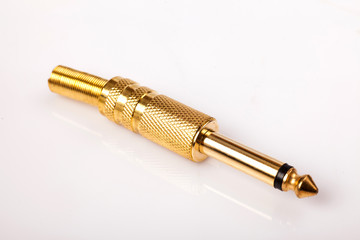 audio jack,plug convertor for video and sound on white background
