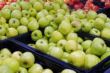 Green apples at grocery store.