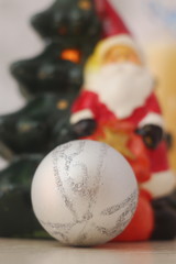 Bright colorful Christmas-tree decorations in white and red tones create a fabulous sensation of Christmas and New Year.