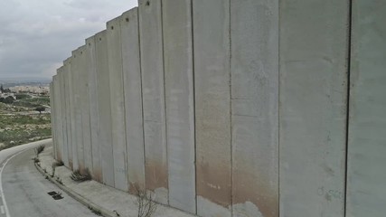 Aerial footage of the separation wall between Israel and the Palestinian Authority in Jerusalem