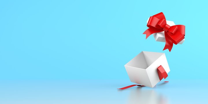 Offene Geschenkbox mit roten Schleife