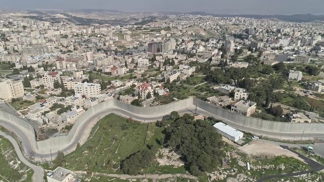Aerial footage of the separation wall between Israel and the Palestinian Authority in Jerusalem