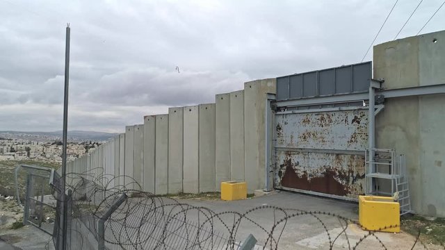 Aerial footage of the separation wall between Israel and the Palestinian Authority in Jerusalem