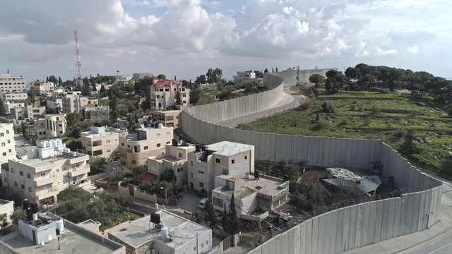 Aerial footage of the separation wall between Israel and the Palestinian Authority in Jerusalem