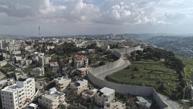 Aerial footage of the separation wall between Israel and the Palestinian Authority in Jerusalem