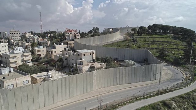 Aerial footage of the separation wall between Israel and the Palestinian Authority in Jerusalem