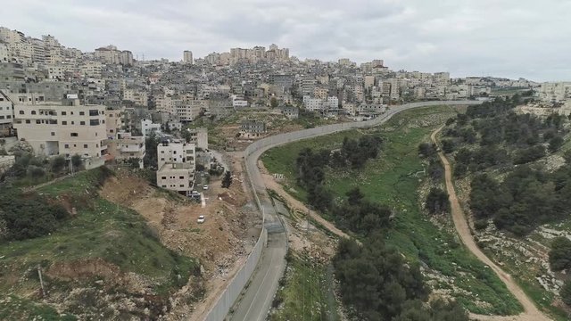 Aerial footage of the separation wall between Israel and the Palestinian Authority in Jerusalem