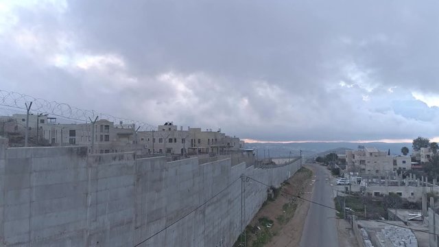 Aerial footage of the separation wall between Israel and the Palestinian Authority in Jerusalem