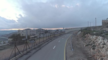 Aerial footage of the separation wall between Israel and the Palestinian Authority in Jerusalem