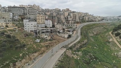 Aerial footage of the separation wall between Israel and the Palestinian Authority in Jerusalem