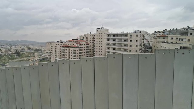 Aerial footage of the separation wall between Israel and the Palestinian Authority in Jerusalem