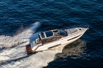 Fototapeta premium luxury motor yacht in navigation, aerial view