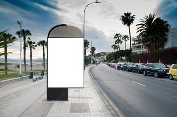 billboard with light in city center with blue sky